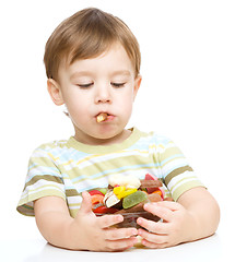 Image showing Portrait of a boy with cookies