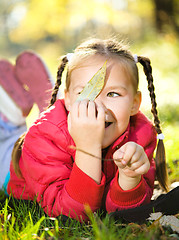 Image showing Portrait of a little girl in autumn park