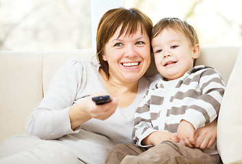 Image showing Mother and her son are watching tv