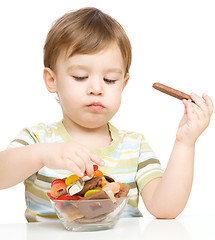 Image showing Portrait of a boy with cookies