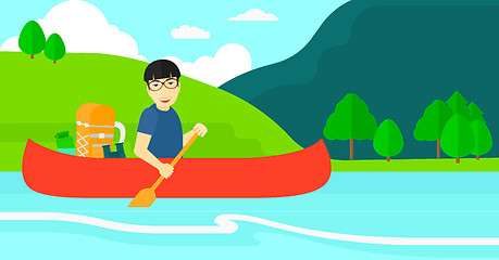 Image showing Man canoeing on the river.