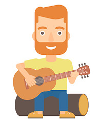 Image showing Man playing guitar.