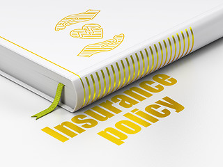 Image showing Insurance concept: book Heart And Palm, Insurance Policy on white background