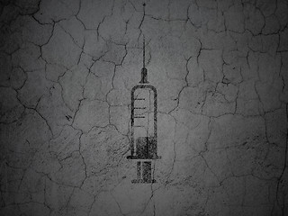 Image showing Health concept: Syringe on grunge wall background