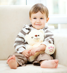 Image showing Portrait of a little boy with his teddy bear