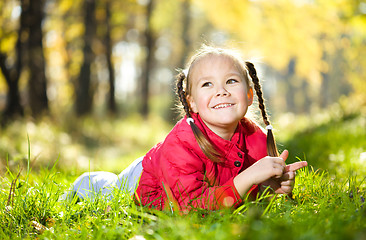 Image showing Portrait of a little girl in autumn park