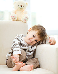 Image showing Portrait of a little boy with his teddy bear