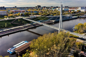 Image showing Pedestrian Lovers Bridge on Tura river. Tyumen