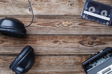 Image showing Cassette tapes, player and headphones . Top view.