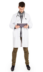 Image showing Doctor holding tablet with copy space and clipping path for the 