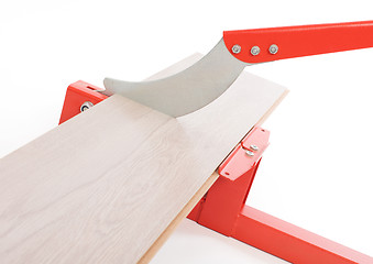 Image showing Red tool for cutting laminate