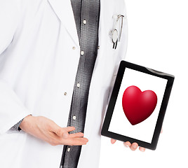 Image showing Doctor holding tablet - Red heart