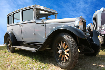 Image showing vintage car on wooden wheel