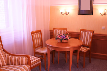 Image showing Table and Chair near Window