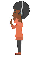 Image showing Woman listening music in headphones
