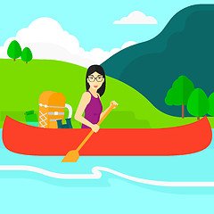 Image showing Woman canoeing on the river.