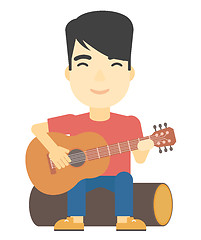 Image showing Man playing guitar.