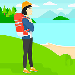 Image showing Woman with backpack hiking.