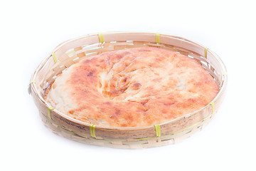 Image showing pita in wicker bread bin on white background