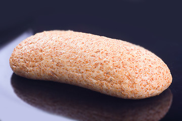 Image showing Large loaf of bread on black