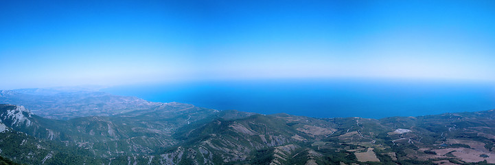 Image showing  top of mountain overhanging sea panorama
