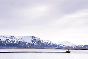 Image showing Small lighthouse in a beuatiful scenery