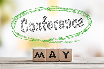 Image showing May conference sign on a wooden table