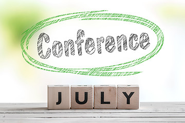 Image showing July conference message on a stage