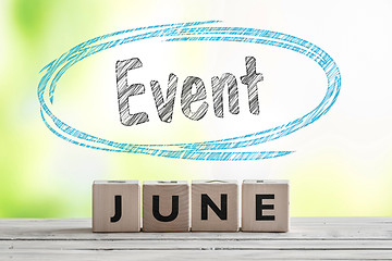 Image showing June event sign on a wooden stage