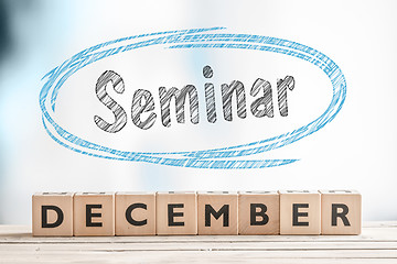 Image showing December seminar sign on a stage