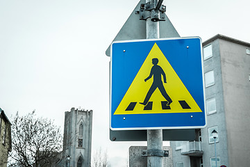 Image showing Pedestrian crossing sign in a big city