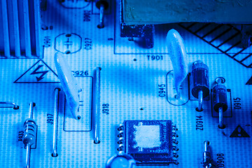 Image showing Capacitors and chips on an electrical device