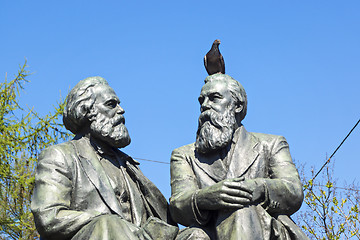 Image showing Pigeon bird on head of statue