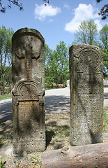 Image showing Two tombstones by the road