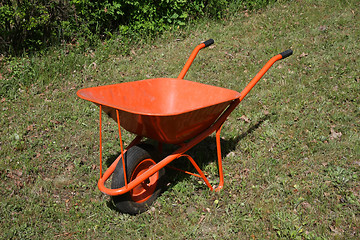 Image showing Orange handwagon in the field