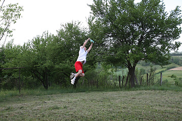 Image showing Young man with frisbee