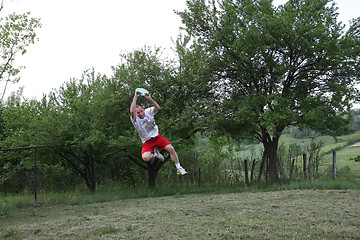 Image showing Young man with frisbee