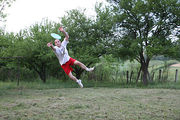 Image showing Young man with frisbee