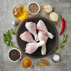 Image showing chicken legs and various spices