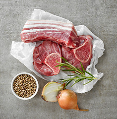 Image showing various raw meat cuts and spices