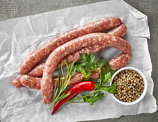 Image showing fresh raw meat sausages