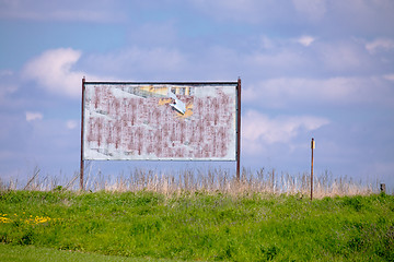 Image showing billboard with old torn posters