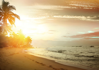 Image showing Pink sunset over ocean