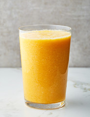 Image showing glass of yellow smoothie