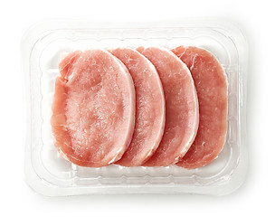 Image showing raw pork chops in plastic try