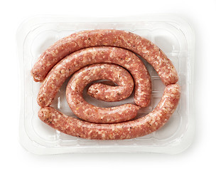Image showing raw pork sausages in plastic try