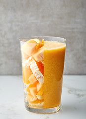 Image showing glass of yellow smoothie