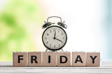 Image showing Friday sign with a classic clock