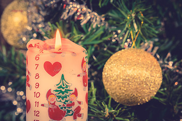 Image showing December calendar candle and a Christmas tree