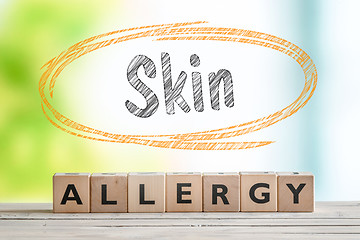 Image showing Skin allergy sign on a wooden table